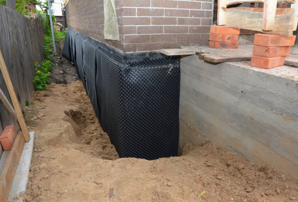 Happy homeowners after waterproofing job in Mount Vernon